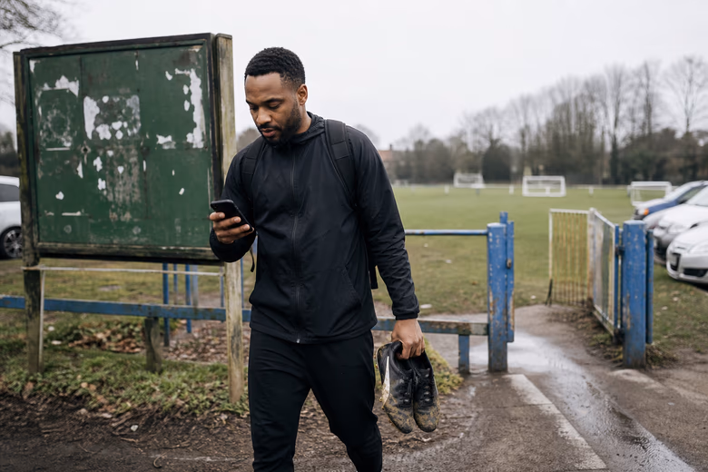 Players training together on a local grassroots football pitch